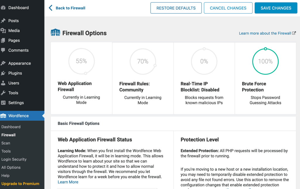 The Wordfence dashboard has metrics prominently displayed with detailed descriptions.